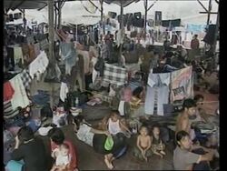 Immigrants stranded in overcrowded refugee centres on Borneo News Clip