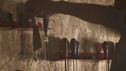 Man reaching for hand tool Stock Footage