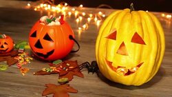 Halloween pumpkin head jack lantern on wooden background Stock Footage