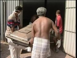 Relatives search for loved ones, mortuary News Clip