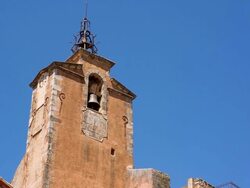 MS Shot of clock tower at Ocre Village / Roussillon, Provence, France Stock Footage