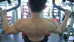 Body builder with Lat pulldown Stock Footage