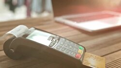 SLO MO PAN POS terminal printing out the slip Stock Footage