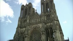 Construction scaffolding is seen on the exterior of the Notre-Dame de Reims. Stock Footage