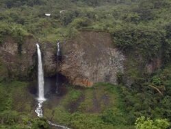 Cascada Manto de la Novia, waterfall on a basalt cliff in the Rio Pastaza gorge near Banos, Ecuador. Stock Footage
