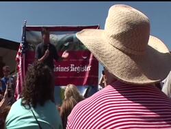 Republican presidential hopeful Mitt Romney, clearly irritated by a handful of hecklers amid supporters at the Iowa State Fair, insisted that "corporations are people," a comment Democrats predicted would be a defining moment of his campaign. News Clip