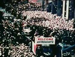 1962 high angle ticker tape parade for John Glenn (first American in orbit) on NYC street / newsreel Stock Footage