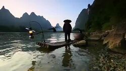 Fishman in Lijiang River Stock Footage
