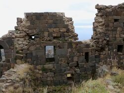 Amberd castle, interior view of the castle, and the Vahramashen church in the buckground Stock Footage