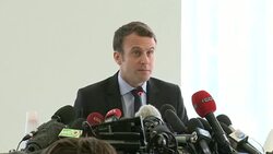 CLEAN : Macron criticises Le Pen after being upstaged in surprise visit News Clip