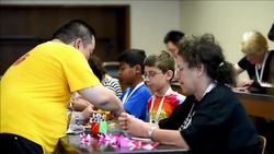 Paper transformed into art at Origami Convention News Clip