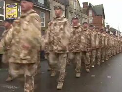 Soldiers marching through Wootton Bassett News Clip