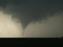 WS View of slender cone tornado moving rapidly from left to right / Silverton, Texas, United States Stock Footage