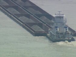 MS POV Tugboat moving coal filled barge in river / Memphis, Tennessee, United States Stock Footage