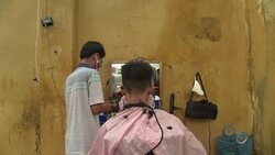 CLEAN : A cut above: Hanoi's deft sidewalk barbers News Clip