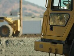 Operating Grader at Construction Site Stock Footage