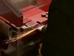 Man sharpens hockey skate Stock Footage