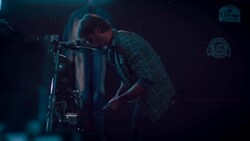 Man in motorcycle workshop building a bike Stock Footage