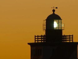 MS Shot of Top of Mouille Point Lighthouse in Cape Town at sunset / Cape Town, Western Cape, South Africa Stock Footage