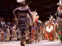native Americans show off their dancing and singing skills through traditional competition at Annual Indio Powwow / Indio, California, USA Stock Footage