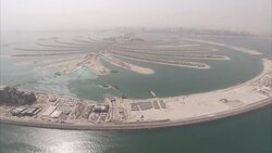 Resorts and beaches surround a man-made Palm island. Stock Footage