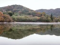 WS T/L View of Autumn scene of Seryangji (Reservoir in the Hwasun) and wet fog / Hwasun, Jeollanam do, South Korea  Stock Footage