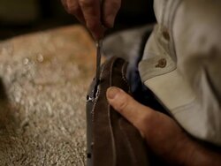 Traditional Shoemaker sticking The Shoe Stock Footage