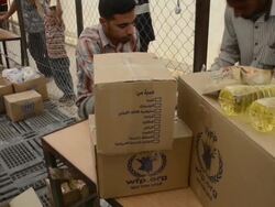 UNHCR supplies handed out Stock Footage