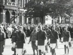 1934: DOLLFUSS FUNERAL: Caisson & coffin being escorted on street, wife Alwine walking w/ unidentified man & Ernst Rudiger prince von Staremberg Vice-chancellor. MS British Prime Minister Stanley Baldwin (1867-1947) speaking w/ men standing BG (No SOT) Instructional Video