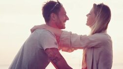 Couple at the beach Stock Footage