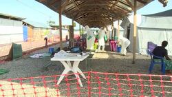 CLEAN : Health workers in Sierra Leone dance to cheer up Ebola patients News Clip