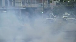 CLEAN : Protesters and police clash in Caracas News Clip