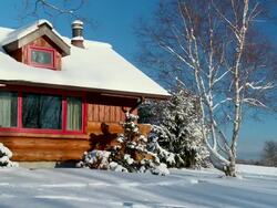 WS View of snow covered log home during winter / Tweed, Ontario, Canada Stock Footage