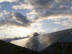 HD Solar Park Against Evening Sky Time Lapse Stock Footage