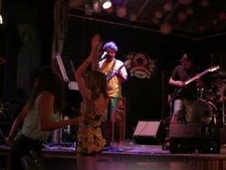 Dancing to live band at club in Belize Stock Footage