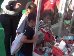 Garcelle Beauvais with kids at the Planes Movie Stock Footage