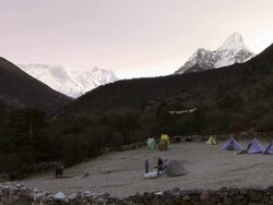 Climbers getting ready at sunrise near Everest. Stock Footage
