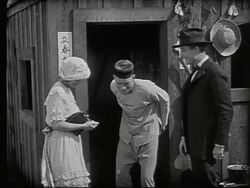 Lon Chaney Sr as Chinese man with couple Stock Footage