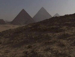 Wide Shot, crane - The Great Pyramids rise above the Giza Plateau / Egypt Stock Footage