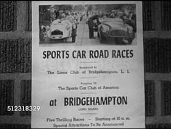 1953: BRIDGEHAMPTON ROAD RACE: Handbill poster on brick wall for sports car road racing in Bridgehampton, Long Island. LA WS Two long lines (POV Center) of sports cars parked on public road, RAISING UP, WS Cars waiting, crowd on both sides of street. Instructional Video