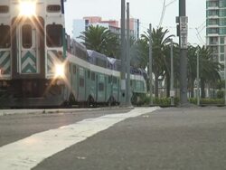 San Diego: Double Decker Commuter Train Crosses Stock Footage