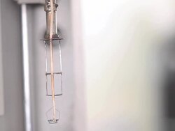 side view move furnace up to cover pan in TGA Stock Footage