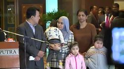 CLEAN : Freed Malaysians arrive home from Pyongyang after Kim row (2) News Clip