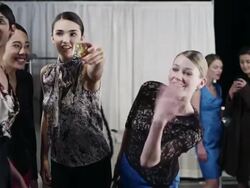 MS Female fashion models backstage at fashion show taking photo with smart phone Stock Footage