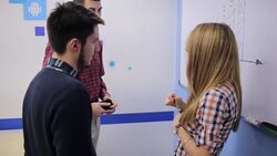 Diverse creative team in modern office working on project Stock Footage