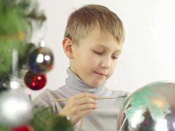 boy and christmas balls Stock Footage