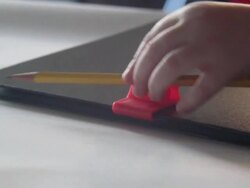 A student snaps his pencil to his education textbook notebook. - Model Released - 1920x1080 - HD Stock Footage