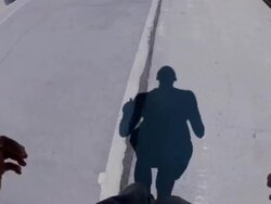 POV of a young man running on a bike path at the beach. Stock Footage