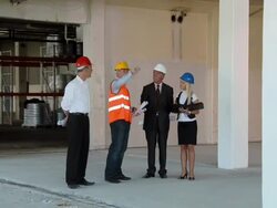 CRANE: Construction professionals Stock Footage