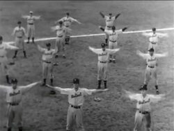 B/W 1938 high angle professional baseball players swinging arms in circles in practice / Detroit Tigers Stock Footage